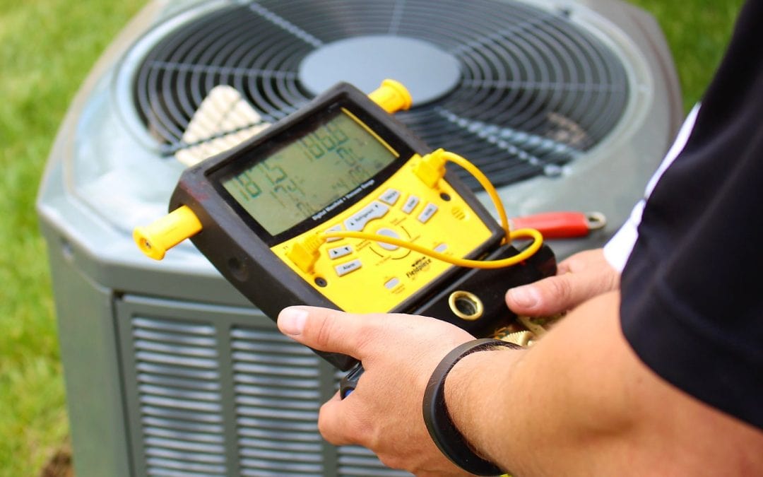 AC repair company checking unit