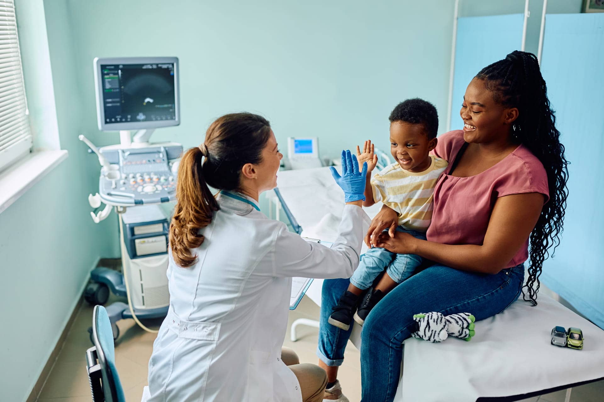 Pediatrician seeing patients