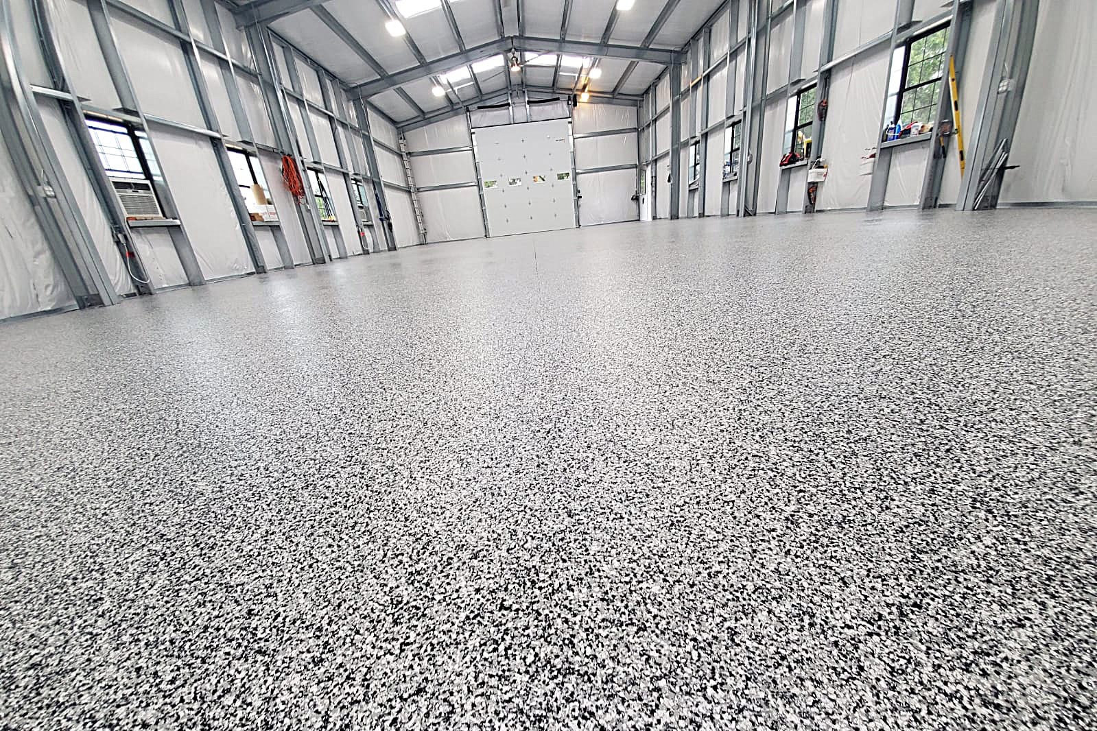 10 Benefits of Epoxy Flooring for Garage Floors grey concrete coating service for garages